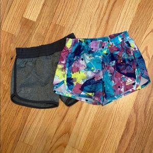 Two pairs athletic running shorts